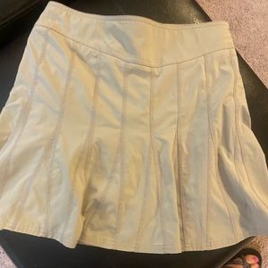 ATHLETA pleated tan "Wear About" skort size 2